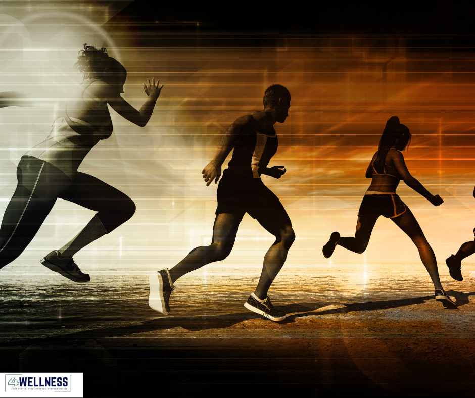 Four runners at speed against a sunrise